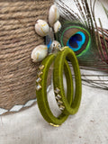 These lightweight thread bangles are carefully handcrafted to provide comfort and style throughout the day. Pair them with sarees, lehengas, salwar suits, and Indo-western outfits for a complete festive look.